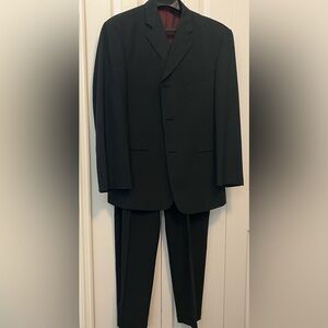 Men’s pinstriped grey and black suit. Size 34x30 42S 
Haggar
Jacket and pants